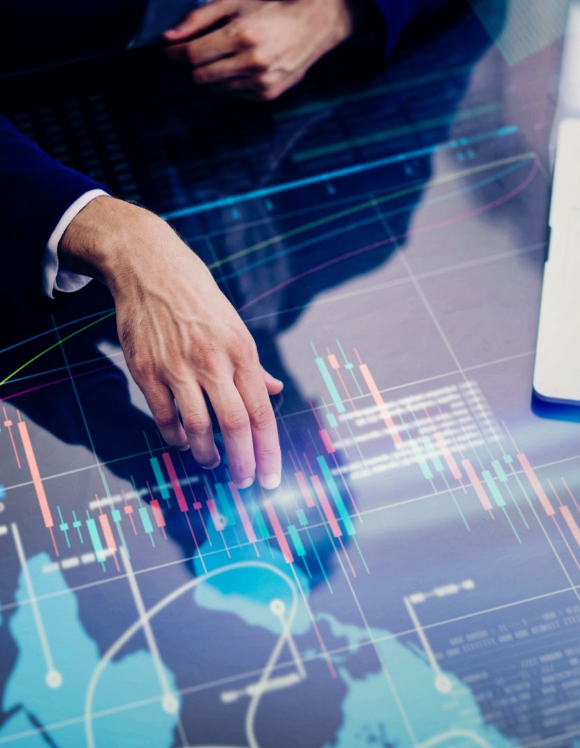 Businessman is analysing financial strategy on a screen of modern hi tech digital tablet. Male hands with futuristic device (1).jpg